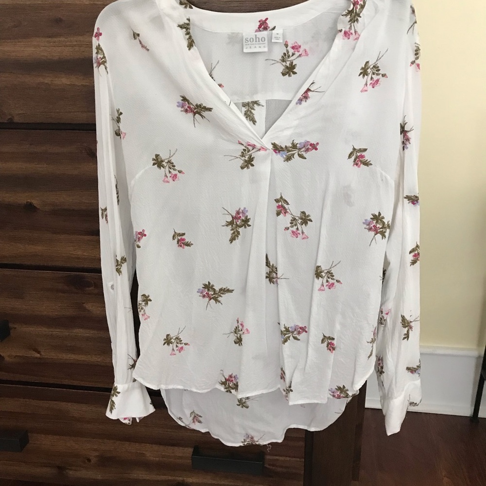 Sheer floral blouse.